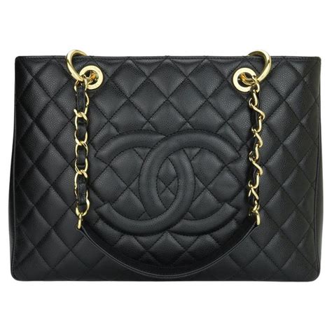 chanel black gst gold hardware|Chanel shopping bag.